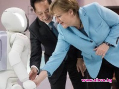  Меркел си общува с робот