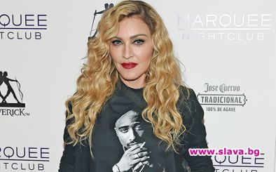Мадона прави френска любов заради Хилъри